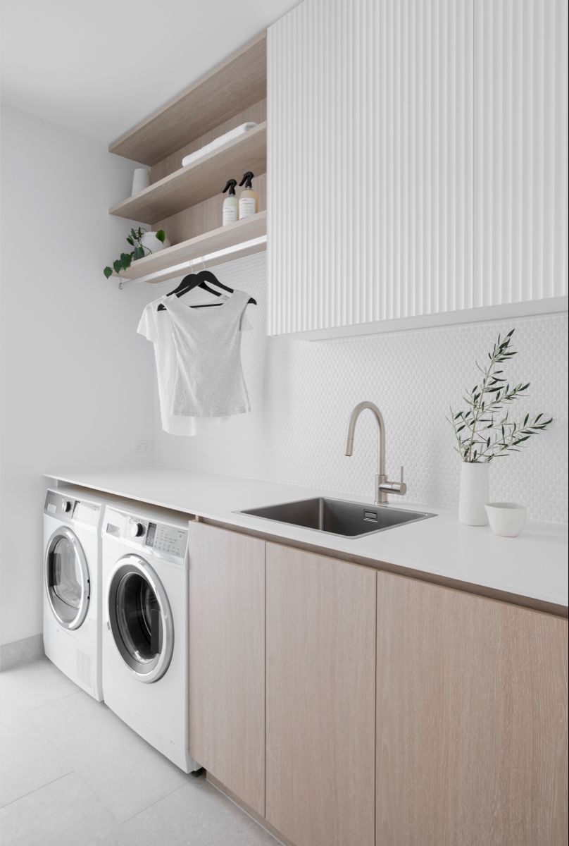 Finished laundry with painting and fixtures complete